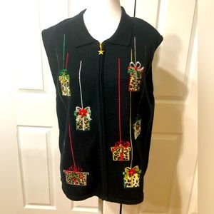 Women’s XL Christmas sweater vest. Black with leopard print packages.